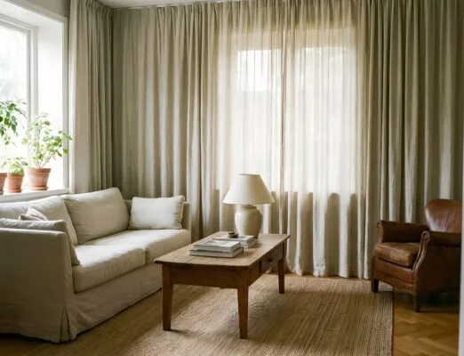 Minimalist home decor trends featuring warm neutral living room